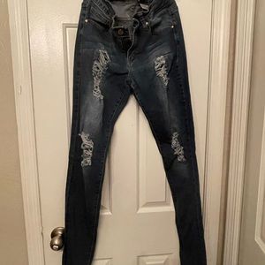 Distressed cut out jeans